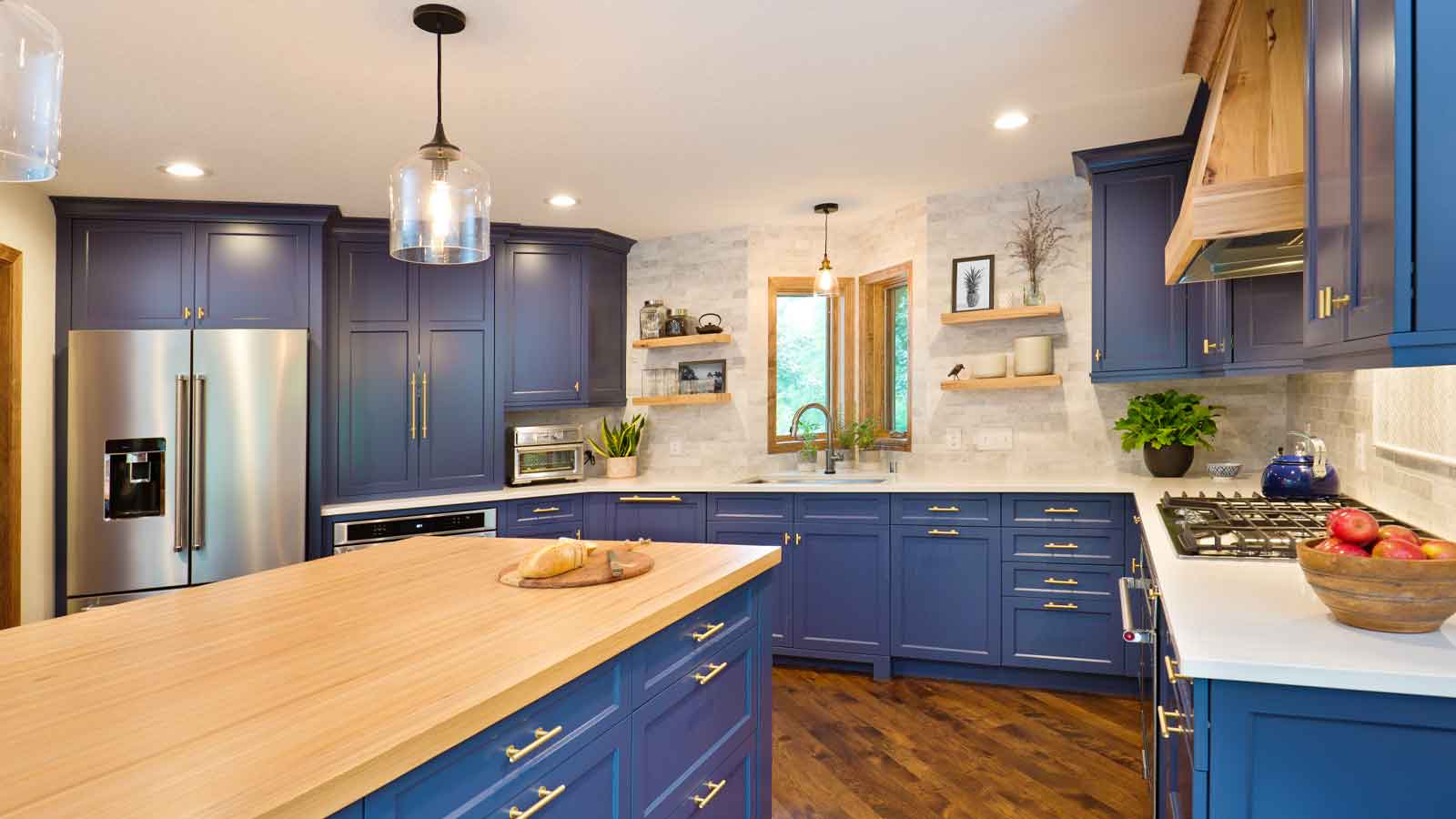 Gorgeous kitchen with custom blue cabinets.